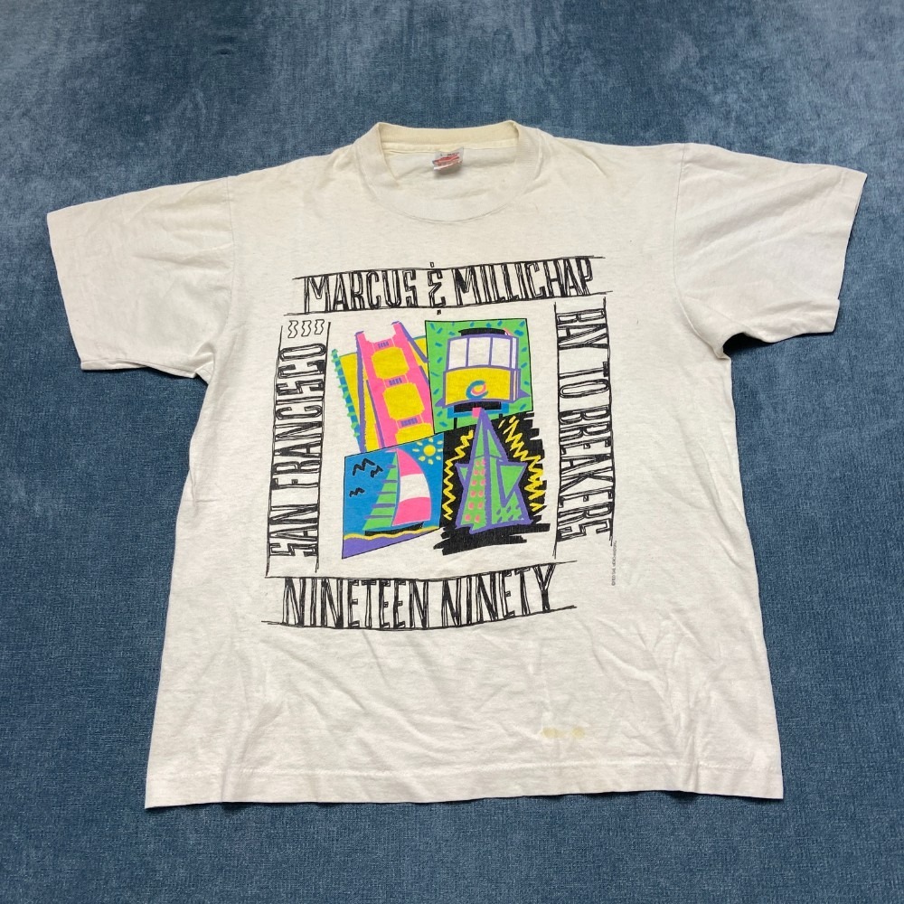 VTG Fruit Of The Loom Marcus & Millichap T Shirt Mens Large Beige Cotton